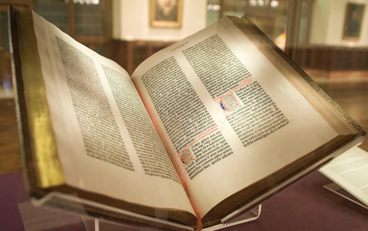 A Gutenberg Bible open on a stand
